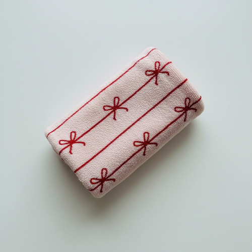 Blush pinstripe quick dry hair towel with hand-drawn bow detail